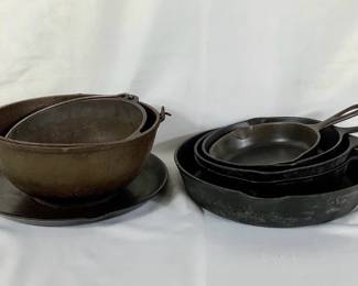 BIHY204 Cast Iron Pans & Bowls	2 Cast Iron mixing bowls. Both do have wear to them. Smaller bowl does have a marking on the bottom(20T) made in the USA.
