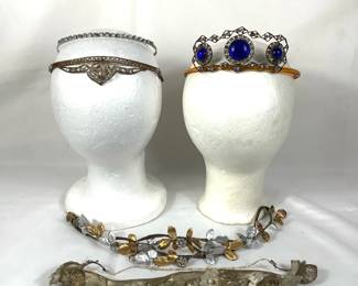 BIHY207 1920’s Flapper Headbands	5 different styles and sizes of Flapper headbands. Some of the headbands do have some missing Rhinestones as shown in the pictures. All silver tiara with the rhinestones has some tarnishing.&nbsp;
