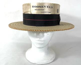 BIHY226 Antique Pedigree Men’s Straw Hat	Roosevelt reception committee straw hat. Has a leather rim inside the hat. Not sure on the history on the hat. Hat dimensions for the inside are approximately..L-6.5in D-8in. Where the Roosevelt is marked looks to be on a silk ribbon.
