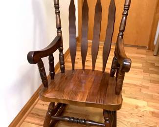 BIHY214 Vintage Press Back Rocking Chair	Believe to be made out of oak or walnut, Hand carved design on top. Looks to be in really good condition. Has protective pads on the bottom of the rockers. Does have some minimum scratches
