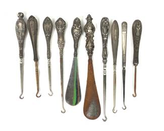 BIHY218 Antique Silver, Silver Plated Shoe Hooks	2 Antique shoe horns, believed to be silver plated, they do have some wear to them.
