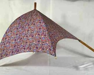 BIHY209 Early 1900’s Doorman’s Silk Parasol	Very RARE & incredible unique and in great condition. It's either French or Italian. Wood handle with silk material. It's approximately 32in long, depth is approximately 20in.
