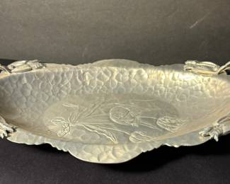 Hammered silver hors d'oeuvres tray with elevated flower handles