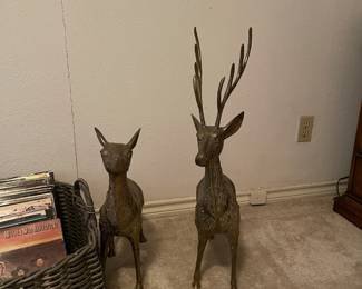 Cute doe and buck statues