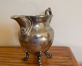 Large creamer/ pitcher in silver over copper