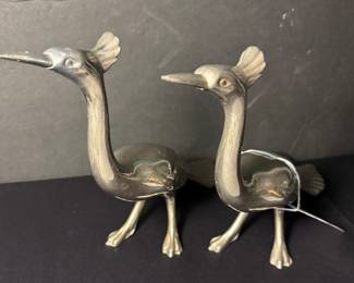 Silver peacock statuettes 