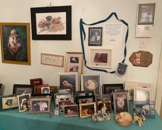 We delighted in seeing all the homeowner's wonderful pet photos as we prepared her house for this sale! In her honor, we are donating proceeds from her many pet photos in pretty frames to Operation Kindness. 