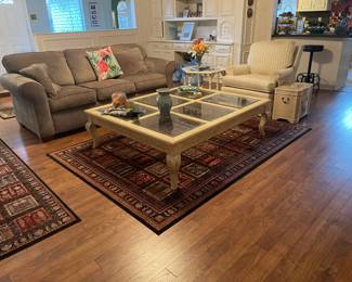 Gray velvet sofa, vanilla side chair with arms, hand painted chest with storage for warm throw blankets.