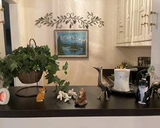 Darling cat figurines of all sizes