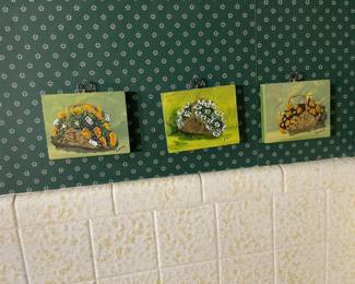 Trio of original oil on canvas artwork of flowers in baskets