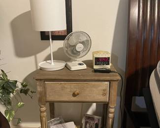 White washed side table with one drawer and shelf underneath