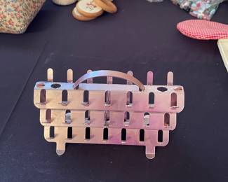 Vintage pink aluminum thread holders (two) 