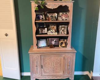 Chest with storage below and three bookshelves 