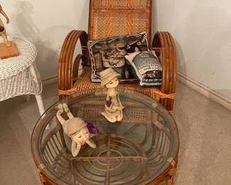 Wicker lounger with round glass top wicker table