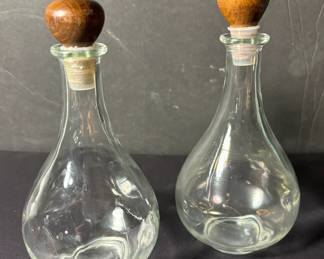 Vintage vinegar and oil salad dressing bottles with cork and wood stoppers