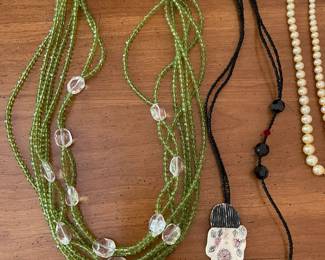 Lime green multi-strand beaded necklace and Asian inspired black seed necklace