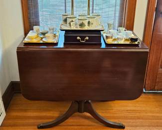 Duncan Pfyffe dropleaf mahogany table and demitasse collection