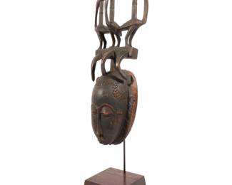 Lot 1 African Baule mask with avian finial Ivory Coast
