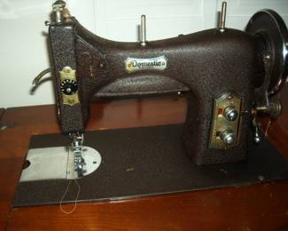 Vintage Domestic sewing machine in sewing desk.