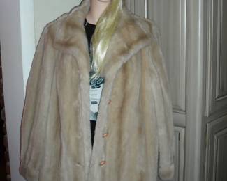 We have several nice fur coats in this sale.  Mannequins are also for sale.