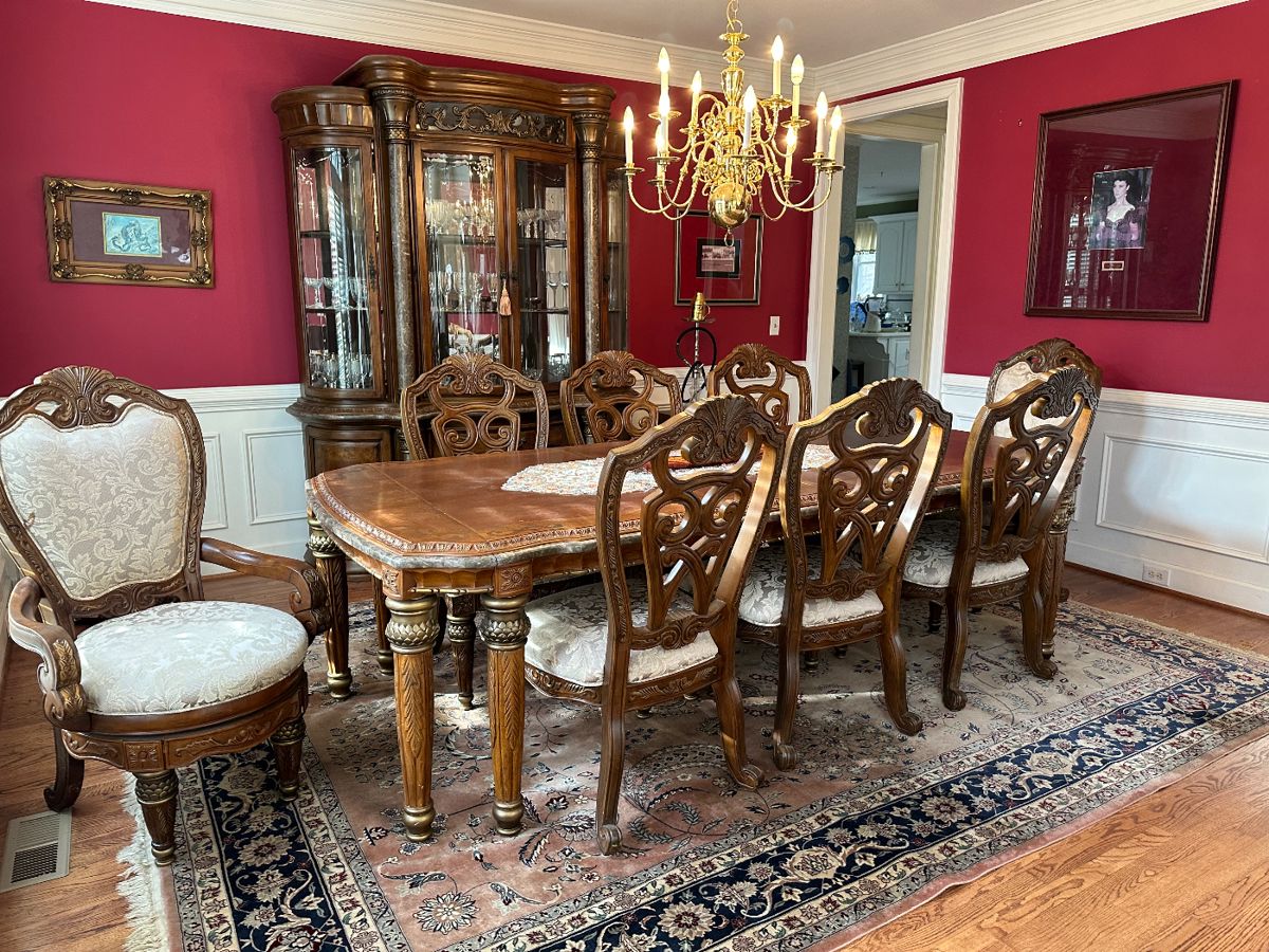 Michael Amini grandiose dining room set with swivel end carvers