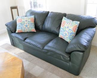 Green leather sofa