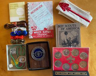 Mint coin collection, classic handbook, Order of the Arrow banner, notebooks