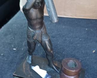 Small shelter bronze figure needs some restoration 