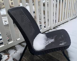 Pair of Keter outdoor chairs with mid century-inspired curves