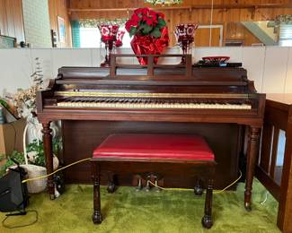 This is a spinet-style piano, perfect for your new musical career.