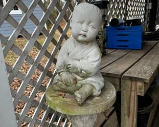 Y14 - $75. Concrete Baby Buddha measures 15" tall. 