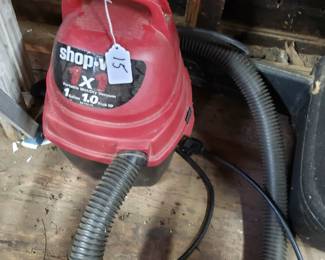 T32 - $15. Shop Vac 1 gallon. 