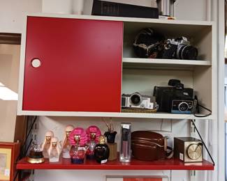 Vintage cameras and perfume bottles