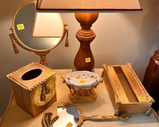 Bedroom 2 | Beautiful ornate brass mirrors, tissue boxes, and a soap dish.