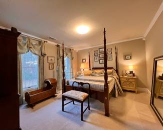Bedroom 2 | A late 20th-century Henredon four-poster rice bed with mattress and box spring, a pair of 1950s mid-century French provincial bedside tables (they match the dresser in the other bedroom), a fine Henredon mahogany armoire/TV cabinet, and a dozen beautiful framed antique cross-stitch fragments.