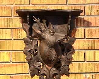 Family Room | A new Black-Forrest style carved stag's head shelf.