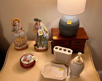 Bedroom 2 | Antique Japanese handpainted figurines, assorted vanity items, and a vintage jewelry box.