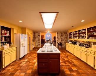 Kitchen | A huge assortment of fine china, vintage Corningware, colorful sets of vintage glassware, every kind of cookware and bakeware imaginable, storage, tools, and much more.