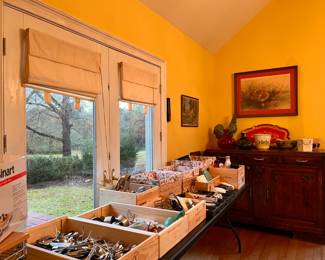 Breakfast Room | Large selection of silver plate and stainless cutlery, kitchen tools, and other items.