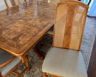 close up of vintage dining set (8 chairs) and rug
