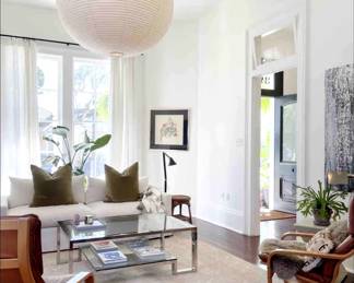 sofa, pillows, coffee table, drapes and rods, rug. leather chairs/lantern NFS, art TBD