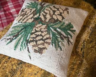 Hooked pillows and expensive Native American and Turkish rugs 