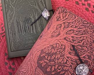 Hand tooled leather journals by Oberon retail for $150 each…brand new, never used!