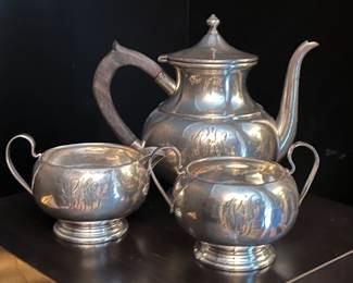 Several antique sterling tea sets from which to choose!