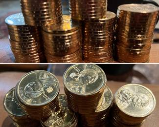 Stacks and stacks of Sacagawea dollars with edge lettering found in a bag and all are brilliant gold finished