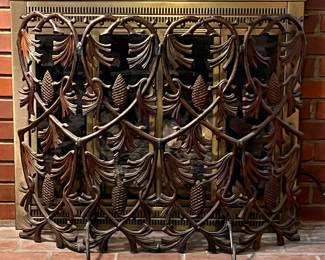 The heaviest wrought iron fire screen which was custom made…pine cone motif