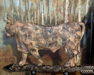 Old cow weather vane 