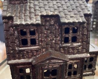 Cottage bank in cast iron