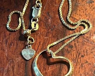 Heavy 14k floating heart pendant on a 30” nice gold chain…1990s 