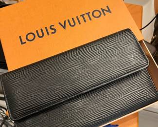 Gently used large Epi leather wallet.